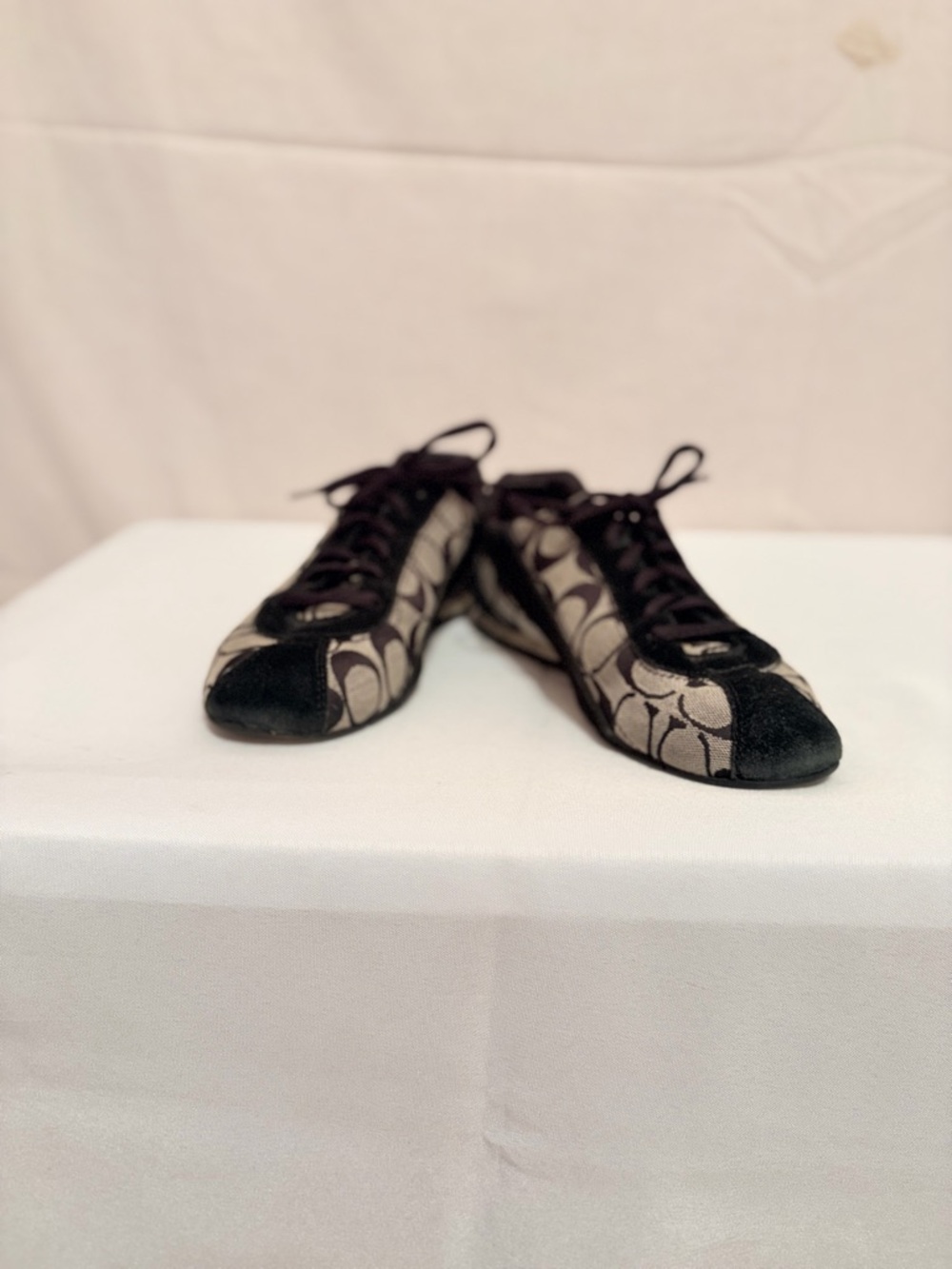 Vintage Coach Katelyn sneakers with signature monogram canvas pattern.